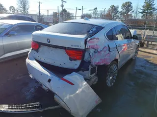 2013 BMW 5 Series GT 535i xDrive with VIN WBASP2C55DC339183, listed as a IAAI auction lot 41359533 with 144,020 mi miles. Bid and sale history available at carsss.com. Image 4.