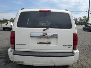 2010 Dodge Nitro SXT z VIN 1D4PT5GK8AW100343, wystawiony jako Copart lot #74628804 z przebiegiem 156 612 mil mil oraz Szkoda całkowita • Salvage title. Historia ofert i sprzedaży dostępna na DreamBid. Obrazek 6.