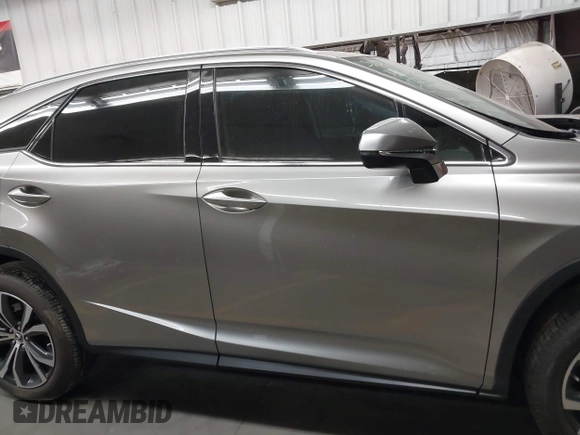 2022 Lexus RX 350 z VIN 2T2HZMDA9NC366292, wystawiony jako IAAI lot #42381449 z przebiegiem 26 717 mil mil oraz . Historia ofert i sprzedaży dostępna na DreamBid. Obrazek 13.