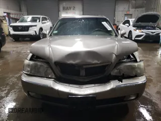 2002 Acura RL z VIN JH4KA96502C012064, wystawiony jako Copart lot #88080895 z przebiegiem 107 477 mil mil oraz Szkoda całkowita • Salvage title. Historia ofert i sprzedaży dostępna na DreamBid. Obrazek 5.