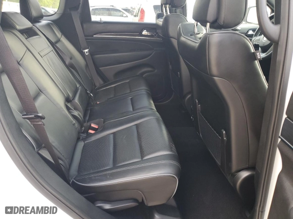 2019 Jeep Grand Cherokee Overland with VIN 1C4RJECG4KC833019, listed as a Copart auction lot 51277555 with 124,072 mi miles and Salvage Title. Bid and sale history available at carsss.com. Image 11.