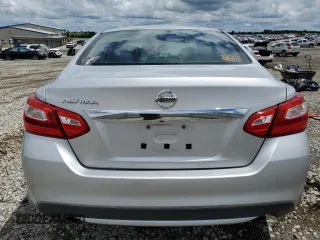 2016 Nissan Altima S z VIN 1N4AL3AP4GC155626, wystawiony jako Copart lot #56680185 z przebiegiem 168 891 mil mil oraz Szkoda całkowita • Salvage title. Historia ofert i sprzedaży dostępna na DreamBid. Obrazek 6.