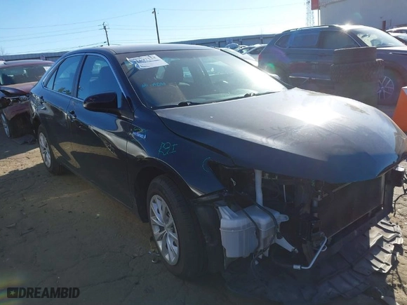 2015 Toyota Camry Hybrid LE with VIN 4T1BD1FK7FU167027, listed as a IAAI auction lot 41697235 with 253,152 mi miles. Bid and sale history available at carsss.com. Image 1.