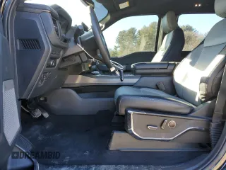 2023 Ford F-150 Lightning Pro with VIN 1FTVW1EL8PWG53681, listed as a Copart auction lot 42681505 with 7,570 mi miles and Salvage Title. Bid and sale history available at DreamBid. Image 7.