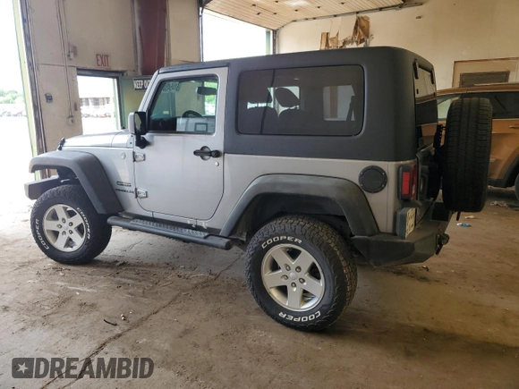 2013 Jeep Wrangler Sport with VIN 1C4GJWAG4DL559422, listed as a Copart auction lot 61454805 with 132,509 mi miles and Salvage title. Bid and sale history available at DreamBid. Image 2.