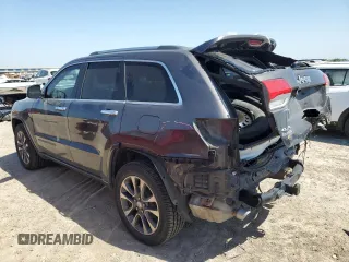 2017 Jeep Grand Cherokee Overland with VIN 1C4RJFCGXHC941983, listed as a Copart auction lot 52008825 with 65,776 mi miles and Salvage Title. Bid and sale history available at carsss.com. Image 2.