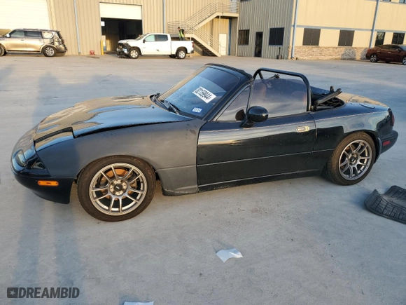 1994 Mazda MX-5 Miata with VIN JM1NA3533R0516342, listed as a Copart auction lot 82159944 with NaN miles and Salvage Title. Bid and sale history available at carsss.com. Image 1.