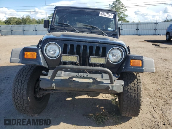 2002 Jeep Wrangler X with VIN 1J4FA39S12P732459, listed as a Copart auction lot 68877244 with 167,368 mi miles and Salvage Title. Bid and sale history available at carsss.com. Image 5.