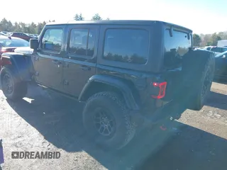 2023 Jeep Wrangler Rubicon with VIN 1C4JJXFGXPW682231, listed as a IAAI auction lot 41110264 with 15,147 mi miles and . Bid and sale history available at DreamBid. Image 3.