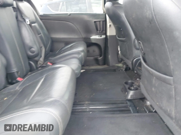 2015 Toyota Sienna SE with VIN 5TDXK3DC3FS534713, listed as a IAAI auction lot 41813651 with 200,030 mi miles and . Bid and sale history available at DreamBid. Image 8.