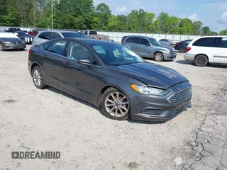 2017 Ford Fusion SE z VIN 3FA6P0HD9HR391891, wystawiony jako IAAI lot #42201144 z przebiegiem 124 625 mil mil oraz . Historia ofert i sprzedaży dostępna na DreamBid. Obrazek 1.