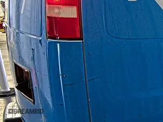 2015 Chevrolet Express Cargo z VIN 1GCWGFCF4F1159616, wystawiony jako IAAI lot #42302393 z przebiegiem 165 549 mil mil oraz . Historia ofert i sprzedaży dostępna na DreamBid. Obrazek 1.