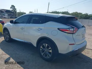 2015 Nissan Murano Platinum z VIN 5N1AZ2MH6FN271481, wystawiony jako IAAI lot #42154544 z przebiegiem 100 623 mil mil oraz . Historia ofert i sprzedaży dostępna na DreamBid. Obrazek 3.