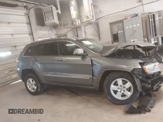 2012 Jeep Grand Cherokee Laredo with VIN 1C4RJFAG3CC209142, listed as a IAAI auction lot 41978296 with 201,796 mi miles. Bid and sale history available at carsss.com. Image 13.