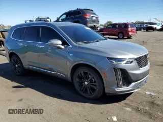 2021 Cadillac XT6 Premium Luxury z VIN 1GYKPCRS8MZ151853, wystawiony jako Copart lot #71057684 z przebiegiem 53 727 mil mil oraz Czysty tytuł • Clean title. Historia ofert i sprzedaży dostępna na DreamBid. Obrazek 4.