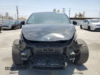 2024 Tesla Model Y Long Range with VIN 7SAYGDEEXRA253111, listed as a Copart auction lot 60929295 with 16,423 mi miles and Salvage title. Bid and sale history available at DreamBid. Image 5.