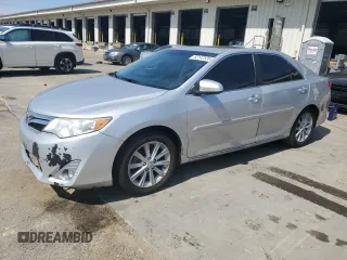 2012 Toyota Camry XLE z VIN 4T1BD1FK9CU058015, wystawiony jako Copart lot #52147635 z przebiegiem 178 555 mil mil oraz Szkoda całkowita • Salvage title. Historia ofert i sprzedaży dostępna na DreamBid. Obrazek 1.
