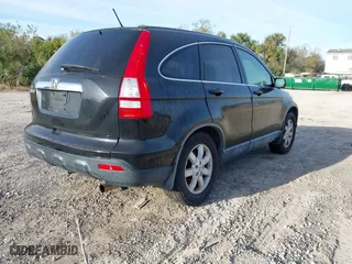 2007 Honda CR-V EX-L with VIN JHLRE48717C010727, listed as a IAAI auction lot 41756338 with 214,976 mi miles. Bid and sale history available at carsss.com. Image 4.