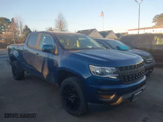 2019 Chevrolet Colorado 4WD LT with VIN 1GCGTCEN0K1268281, listed as a IAAI auction lot 41636235 with 56,550 mi miles. Bid and sale history available at carsss.com. Image 13.
