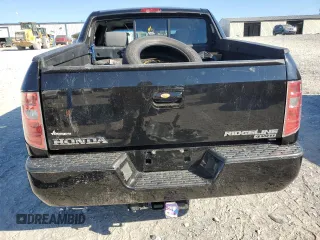2007 Honda Ridgeline RTL w/Leather with VIN 2HJYK16547H528843, listed as a Copart auction lot 60605824 with 0 mi miles and Salvage Title. Bid and sale history available at carsss.com. Image 6.