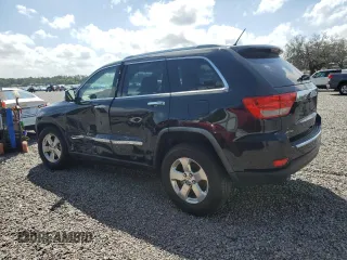 2012 Jeep Grand Cherokee Limited with VIN 1C4RJEBG8CC150999, listed as a Copart auction lot 50620385 with 148,697 mi miles and Salvage Title. Bid and sale history available at carsss.com. Image 2.