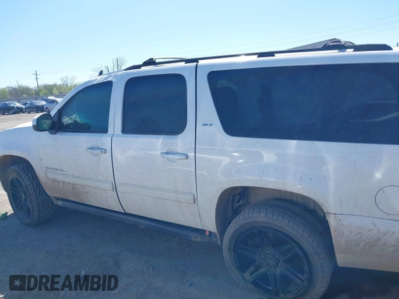 2013 GMC Yukon XL SLT z VIN 1GKS2KE77DR326758, wystawiony jako IAAI lot #41851754 z przebiegiem 144 976 mil mil oraz . Historia ofert i sprzedaży dostępna na DreamBid. Obrazek 14.