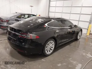 2018 Tesla Model S 75D with VIN 5YJSA1E2XJF248751, listed as a IAAI auction lot 42079081 with 75,904 mi miles and . Bid and sale history available at DreamBid. Image 4.