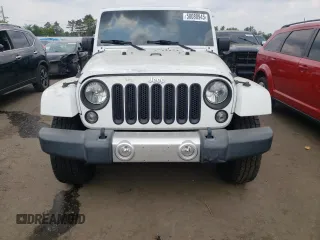 2015 Jeep Wrangler Unlimited Sahara z VIN 1C4BJWEG6FL627890, wystawiony jako Copart lot #58080945 z przebiegiem 145 941 mil mil oraz Szkoda całkowita • Salvage title. Historia ofert i sprzedaży dostępna na DreamBid. Obrazek 5.