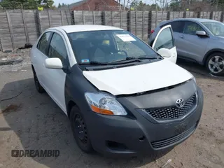 2010 Toyota Yaris with VIN JTDBT4K32A1388469, listed as a IAAI auction lot 42071544 with 159,221 mi miles. Bid and sale history available at carsss.com. Image 1.