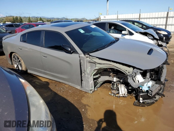 2023 Dodge Charger GT with VIN 2C3CDXHG0PH670993, listed as a Copart auction lot 48915405 with 7,740 mi miles and Salvage Title. Bid and sale history available at DreamBid. Image 4.
