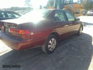 2001 Toyota Camry CE with VIN 4T1BG22K81U057843, listed as a IAAI auction lot 41679958 with 375,284 mi miles. Bid and sale history available at carsss.com. Image 4.