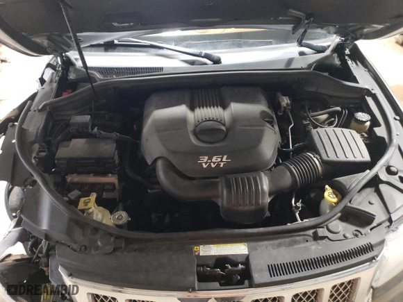 2012 Jeep Grand Cherokee Overland with VIN 1C4RJFCG0CC248462, listed as a Copart auction lot 46648895 with 99,479 mi miles and Salvage Title. Bid and sale history available at carsss.com. Image 11.