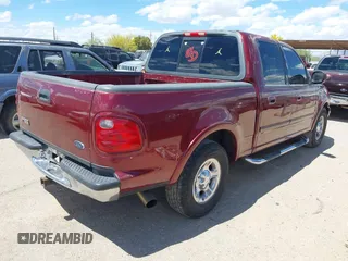 2003 Ford F-150 XLT with VIN 1FTRW07693KC11903, listed as a IAAI auction lot 41993455 with 301,023 mi miles. Bid and sale history available at carsss.com. Image 4.