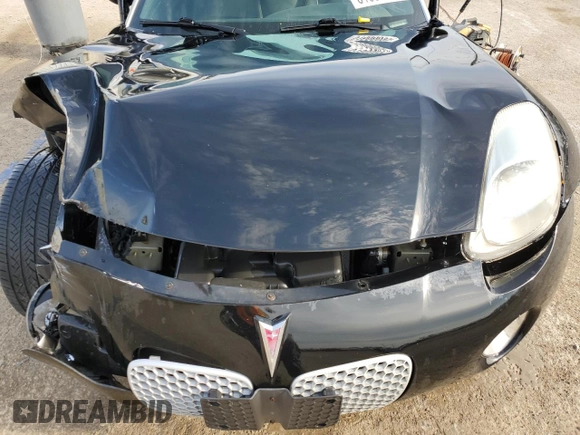 2006 Pontiac Solstice z VIN 1G2MB33B96Y106939, wystawiony jako Copart lot #51606095 z przebiegiem 91 707 mil mil oraz Szkoda całkowita • Salvage title. Historia ofert i sprzedaży dostępna na DreamBid. Obrazek 11.