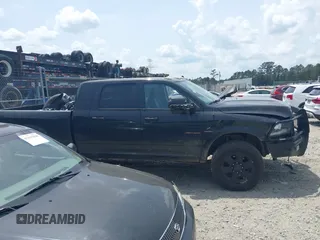 2018 Ram 2500 Laramie with VIN 3C6UR5NLXJG256688, listed as a IAAI auction lot 42168537 with 214,596 mi miles and . Bid and sale history available at DreamBid. Image 13.