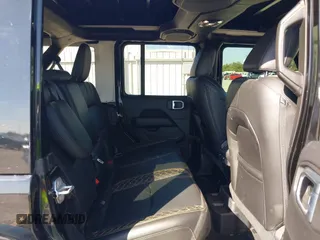 2021 Jeep Wrangler Unlimited Sahara with VIN 1C4JJXP68MW863992, listed as a IAAI auction lot 40618902 with 30,112 mi miles and . Bid and sale history available at DreamBid. Image 8.