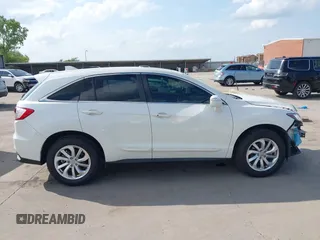 2018 Acura RDX with VIN 5J8TB3H39JL010714, listed as a IAAI auction lot 42128591 with 113,499 mi miles and . Bid and sale history available at DreamBid. Image 14.