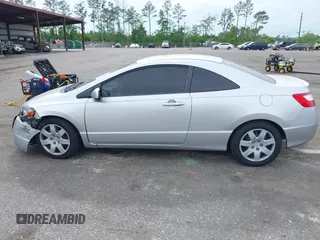 2007 Honda Civic Cpe LX with VIN 2HGFG12667H577166, listed as a IAAI auction lot 41983064 with 98,553 mi miles. Bid and sale history available at carsss.com. Image 14.