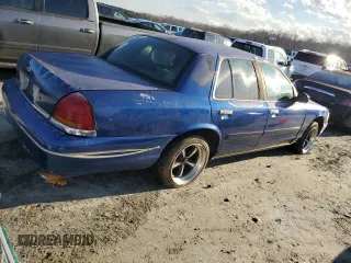 1998 Ford Crown Victoria Police with VIN 2FAFP71W5WX174213, listed as a Copart auction lot 87191094 with 288,723 mi miles and Salvage Title. Bid and sale history available at carsss.com. Image 3.