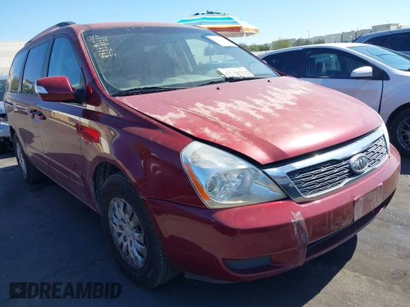 2012 Kia Sedona LX with VIN KNDMG4C70C6443649, listed as a IAAI auction lot 41662007 with 208,575 mi miles. Bid and sale history available at carsss.com. Image 1.