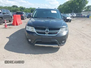2013 Dodge Journey SXT with VIN 3C4PDDBG1DT615217, listed as a IAAI auction lot 42728052 with 234,347 mi miles and . Bid and sale history available at DreamBid. Image 6.