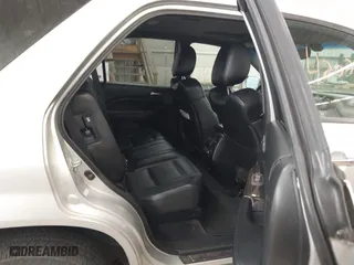 2006 Acura MDX Touring w/Navi with VIN 2HNYD18856H545679, listed as a IAAI auction lot 42026404 with 164,698 mi miles. Bid and sale history available at carsss.com. Image 8.