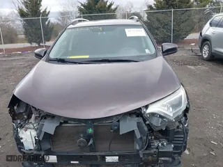 2016 Toyota RAV4 LE with VIN 2T3BFREV5GW437868, listed as a IAAI auction lot 41723004 with 142,793 mi miles. Bid and sale history available at carsss.com. Image 13.