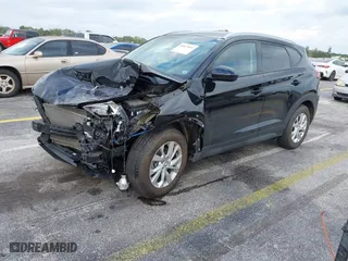 2019 Hyundai Tucson Value with VIN KM8J33A40KU068014, listed as a IAAI auction lot 40877057 with 34,966 mi miles. Bid and sale history available at carsss.com. Image 17.