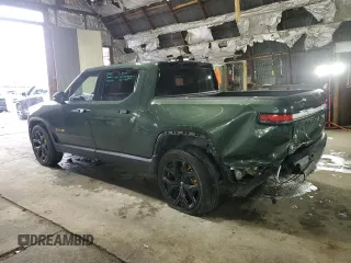 2023 Rivian R1T Adventure with VIN 7FCTGAAA0PN024165, listed as a Copart auction lot 84265444 with Not Provided miles and Salvage Title. Bid and sale history available at carsss.com. Image 2.