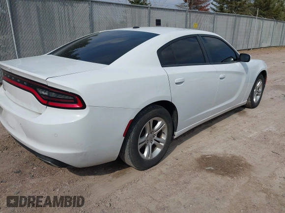 2020 Dodge Charger SXT z VIN 2C3CDXBG4LH213896, wystawiony jako IAAI lot #42143333 z przebiegiem 76 592 mil mil oraz . Historia ofert i sprzedaży dostępna na DreamBid. Obrazek 4.