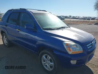 2006 Kia Sportage LX with VIN KNDJF723267158472, listed as a IAAI auction lot 41518202 with 123,178 mi miles and . Bid and sale history available at carsss.com. Image 1.