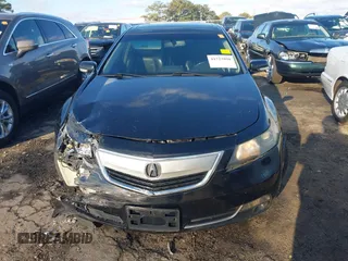 2012 Acura TL Tech Auto with VIN 19UUA8F50CA025948, listed as a IAAI auction lot 41723890 with 203,424 mi miles. Bid and sale history available at carsss.com. Image 12.