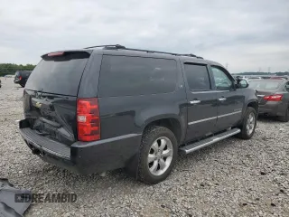 2010 Chevrolet Suburban LTZ with VIN 1GNUCKE09AR194433, listed as a Copart auction lot 69926234 with 243,386 mi miles and Salvage Title. Bid and sale history available at carsss.com. Image 3.