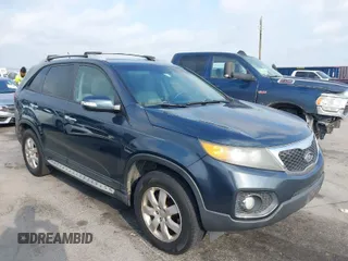 2011 Kia Sorento LX with VIN 5XYKT4A13BG186953, listed as a IAAI auction lot 42075887 with 214,444 mi miles. Bid and sale history available at carsss.com. Image 1.